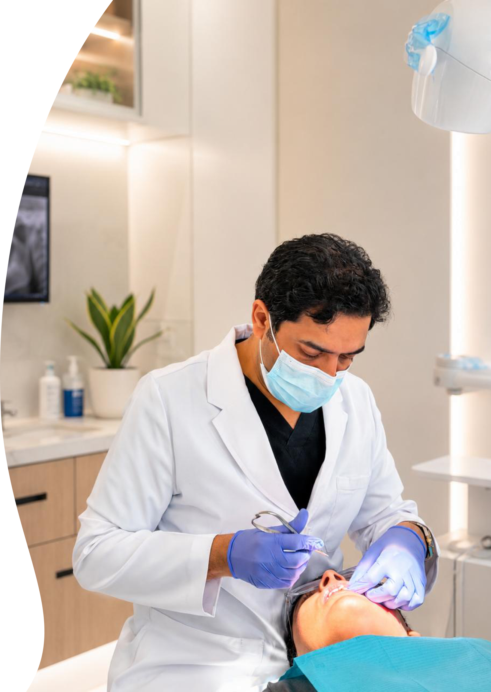 Orthodontist treating a patient